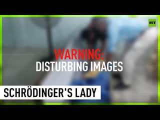 Woman bangs on coffin to be let out during funeral