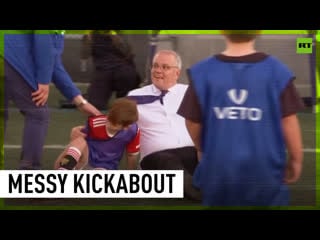 Aussie pm accidentally bulldozes 8 year old during football match