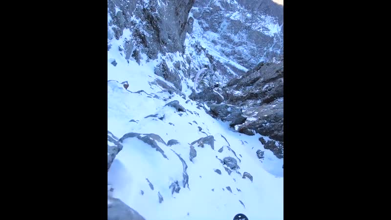 Porn ski gliding through some tight terrain