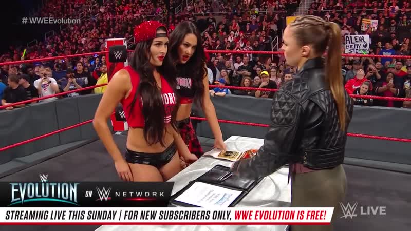 Ronda rousey nikki bella come face to face for womens title contract signing