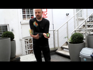 Solving 3 rubiks cubes in under 20 seconds whilst juggling mills mess