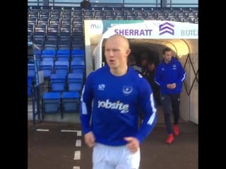 #pompey emerge from the tunnel for the warm ups as the boss looks on