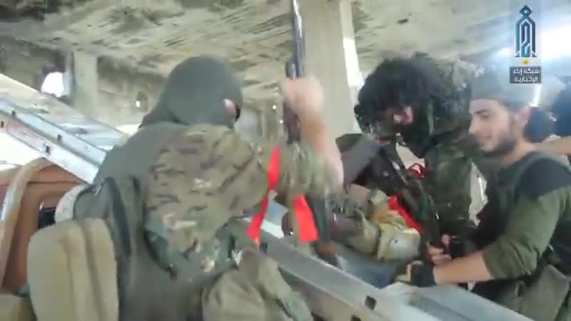 Боевики "хейят тахрир аш шам" во время подготои к атаке на хаммият на севере провинции хама