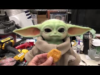 This custom made baby yoda animatronic deserves all the chicky chicky nuggs