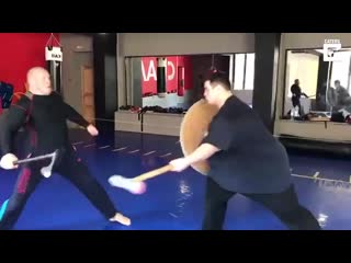 Wcgw if my trainer swings an axe at me while i defend using a flimsy shield &amp; a crappy mallet