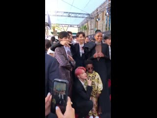 Our boys posing with @ciara and the best dressed bbmas attendee! @bts twt btsone