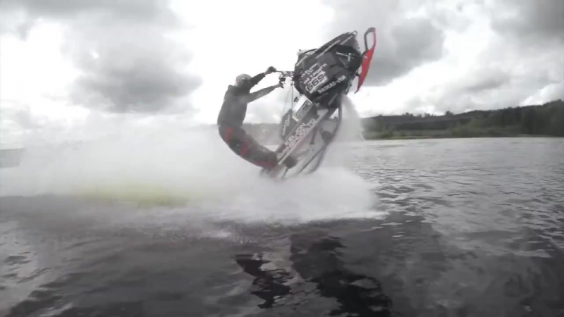 Snowmobile wheelies on water