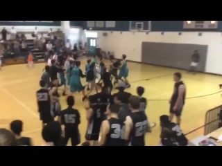 A 13 year old porn with no arms won a basketball game with a 3 pointer