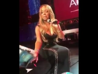 Mariah carey sign autographs to a few lambs!