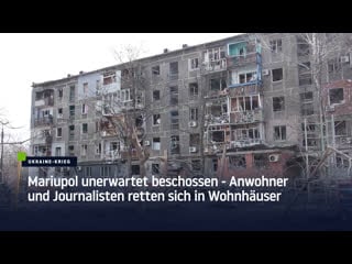 Mariupol unerwartet beschossen – anwohner und journalisten retten sich in wohnhäuser