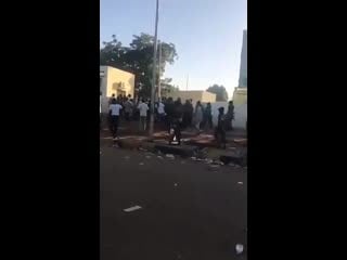 Members of sudanese national intelligence and security service dressed in army fatigue using brute force on those cought