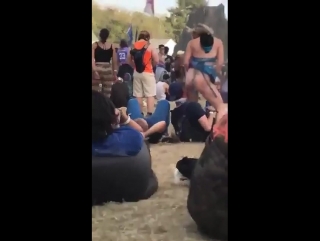 Wasted girl at a festival goes crazy