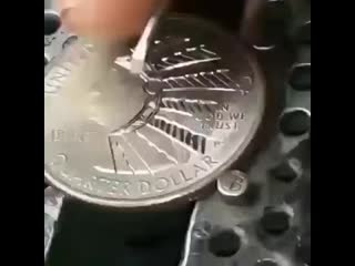 Engraving a smoking indian chief on a washington quarter