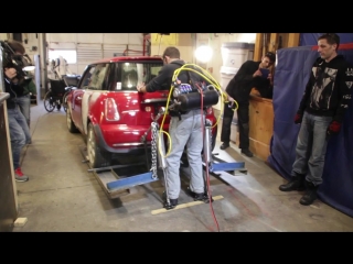 Homemade exoskeleton lifts mini cooper!