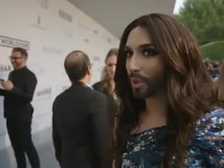 Interview conchita wurst on being at amfar at amfar red carpet at hotel du cap eden roc on may 22, 2014 in cap d#39;antibes