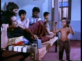 Breakdancing midget scene from adhisaya piravi