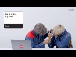 Jaemin and jeno measuring their hands