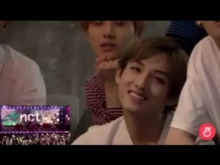 Winwin looks so happy to be watching their performance on kimmel wow who’s cutting onions