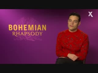 Rami malek from bohemian rhapsody meets a queen superfan