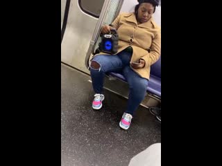 Some lady on the train listening to bladee out loud