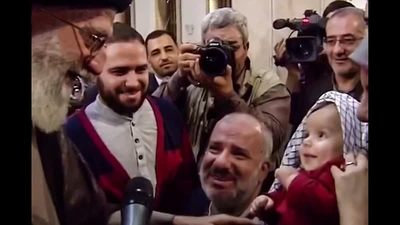 Ayatollah khamenei presented his keffiyeh to a disabled veteran's grandchild