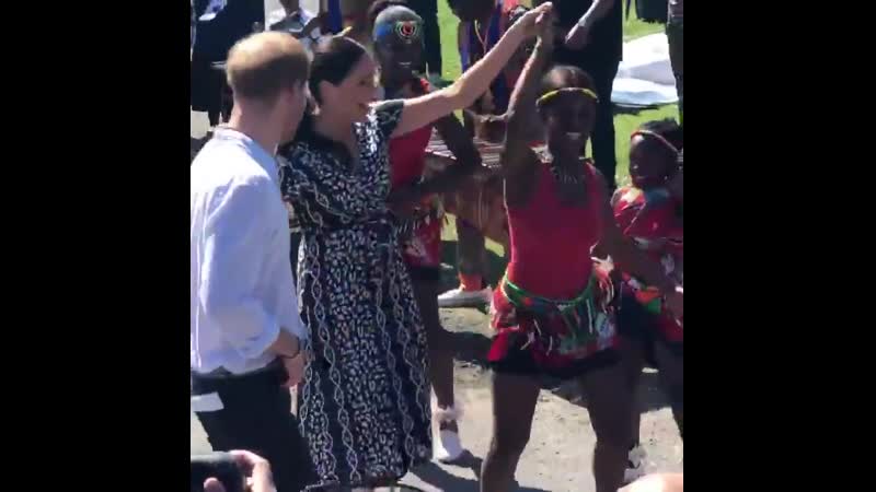 Lovely scenes as harry and meghan depart nyanga, with a spot of dancing from the duchess this time!
