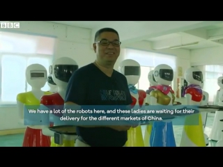 Inside a factory making robot waiters and waitresses