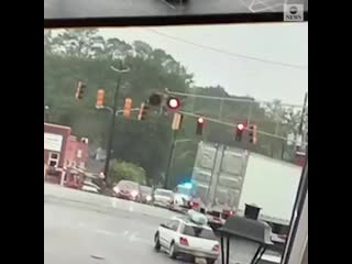 Abc news on instagram dramatic video shows a train slam into the rear of a tractor trailer as it appears to get hung up drivin