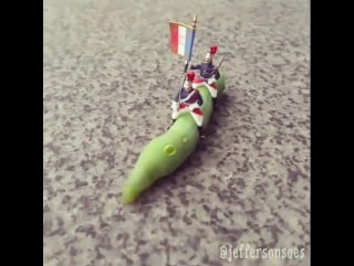 French soldiers riding a real caterpillar