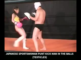Girl kicks in the man balls
