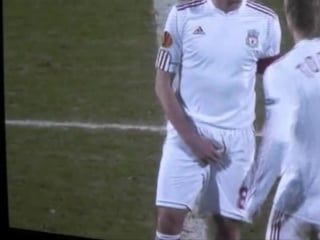 Footballer steven gerrard grabbing his crotch