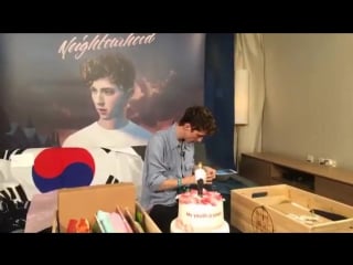 Troye was given a traditional korean hanbok more during his visit to korea