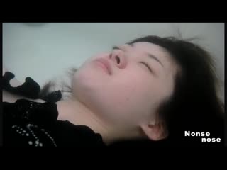 Asian girl breath holding underwater in the tub