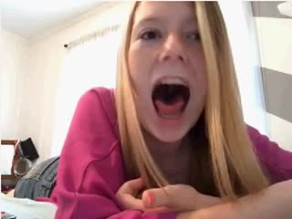 Blonde girl on younow showing her tongue, teeth & uvula