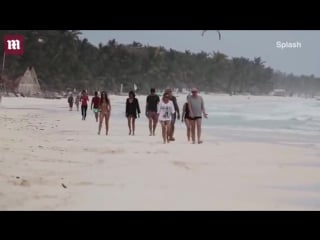 Nina dobrev keeps it tight on the beach with pals in tulum