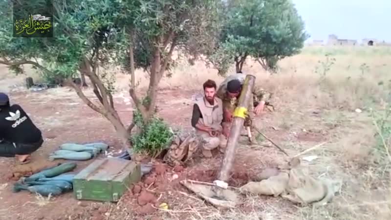 Боевики "национального фронта освобождения" в боях за высоту тель малах на севере провинции хама#1