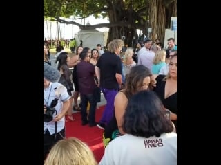 Meaghan rath arrives at sunset on the beach