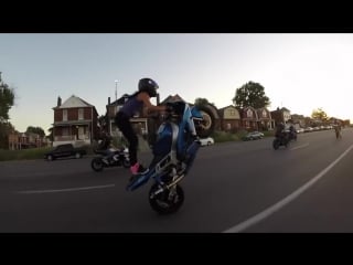 Crazy girl does motorcycle stunts on st louis streets 2015