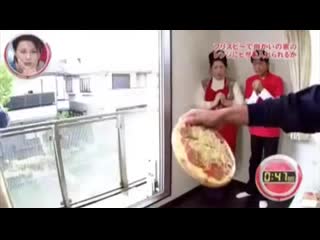 Professional japanese frisbee thrower throws a pizza out of the house into another house tv in japan is wild