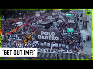 Demonstrators hit streets of buenos aires to protest welfare cuts demanded by imf