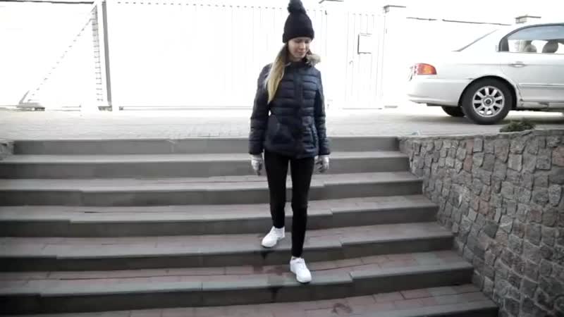 Wetlook girl with winter clothes swims in the