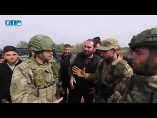 Syrian sna fighters welcome turkish soldiers idlib