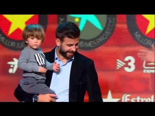 Shakira and gerard with their sons at the catalan football gala