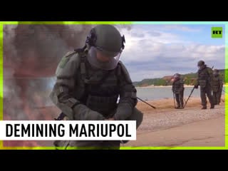 Russian sappers and service doggos demine mariupol coastline