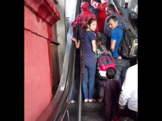 Showing my long hair braid on escalator 😊