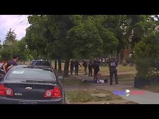 Bodycam shows suspect firing at detroit police officers before being