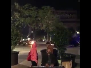 Man calmly plays a piano as chaotic anti lockdown demonstrations unfold around him in #barcelona, spain