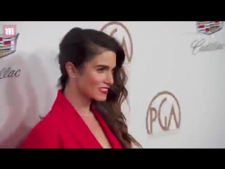 Nikki reed dazzles in red at producers guild awards in la