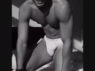 Hot male model in bed