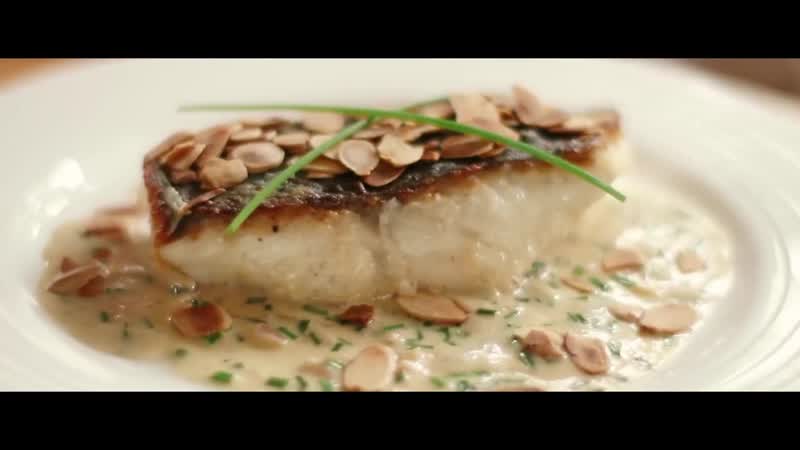 Crispy skin fish almondine with cream sherry sauce and crunchy almonds